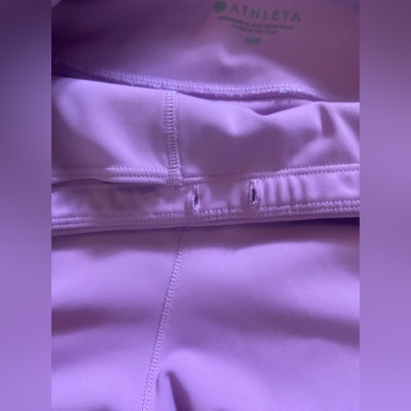 Athleta Women’s Size MP Purple Contender Laser Cut 7/8 Leggings with Zip Pockets - Picture 6 of 10